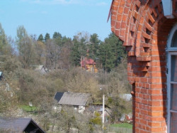 kruczek83 
Widok z dzwonnicy na kapliczke cmentarna 
2006-07-25 10:41:35