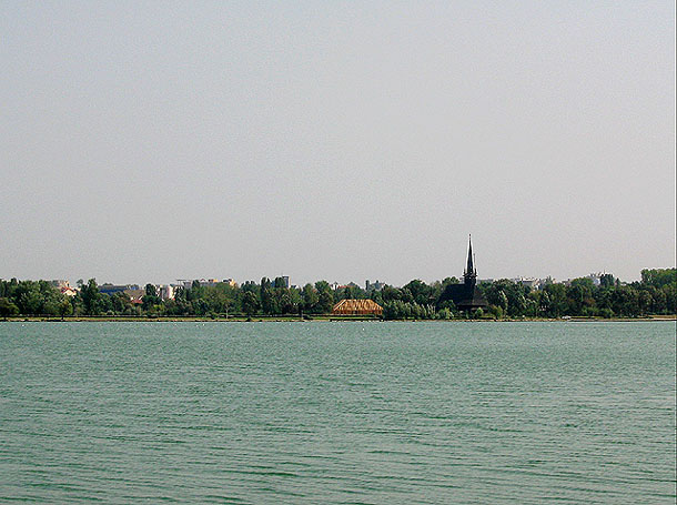 Lake and church besides Black Sea