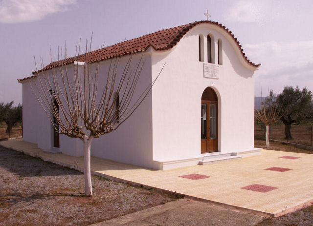 Small church in olives plain ...