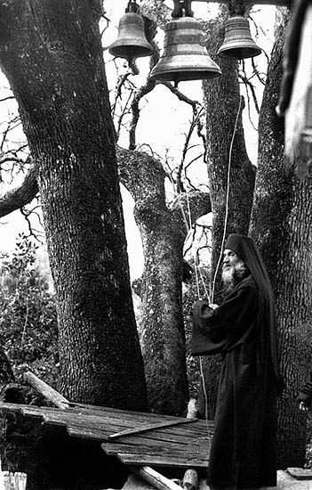 Monk ringing bells