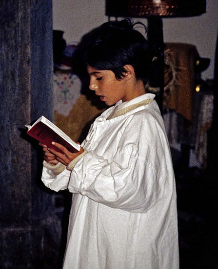 Boy reading Epistle