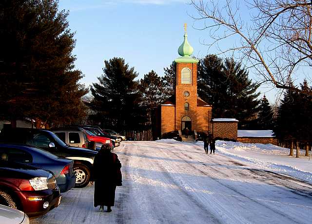 Arriving for the Christmas service, sunset December 24