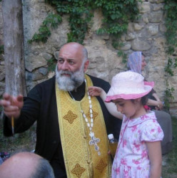 ket_ketusia 
Fr. Aleksandr and his 11th daughter Anna. 
2008-06-07 19:56:55
