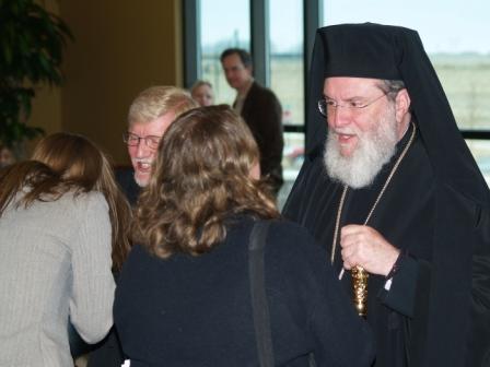Bishop Basil, Fr. David greeting the faithful