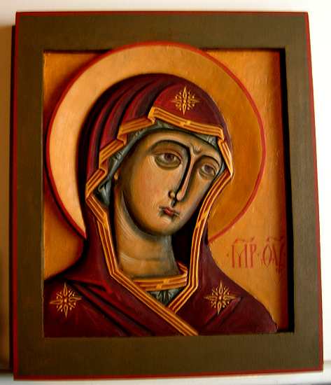An icon written by carving and painting
