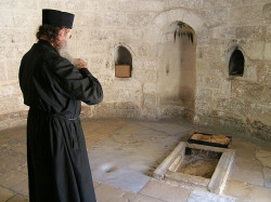 catalintu 
Monk praying at the Ascension Chappel in Jerusalem 
2009-05-27 20:22:34