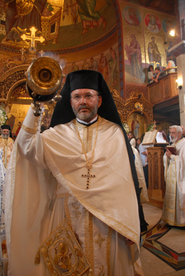 Fr Ioakeim censes during the Αrtoklasia for the Feast of the Dormition of the Mother of God.