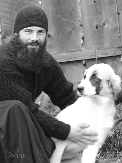 The same young monk and the same caucasian dog (grown up 4 months) 