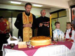dule 
Православни и католички свештеник на заједничком посл 
2011-06-27 11:51:04