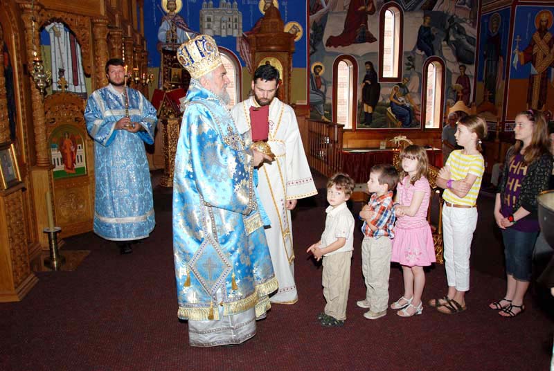 Bishop and children