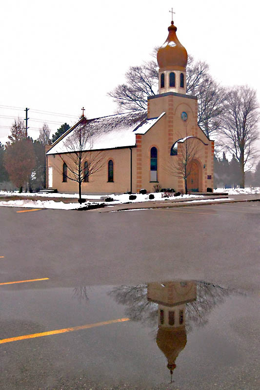 St. George  Serbian Orthodox  Church in Waterloo,ON,Canada-shadows in the puddle