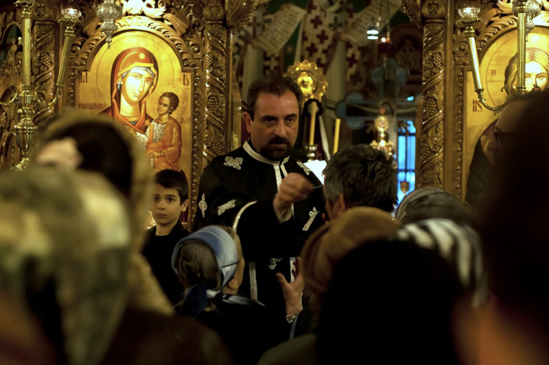 Pr. Daniel Goga anointing people