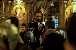 dumitru.tudor 
Pr. Daniel Goga anointing people 
2012-06-07 02:04:38