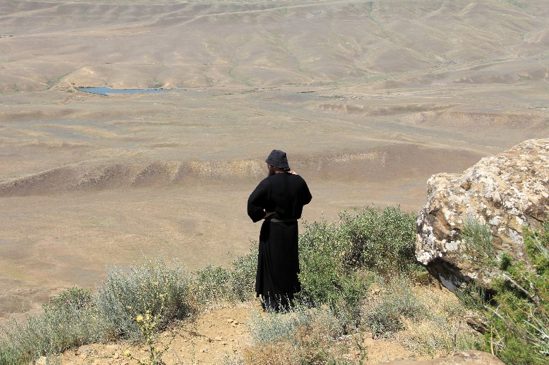 Georgian monk looking at former Georgian land...