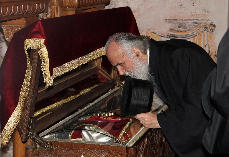 Serbian Patriarch Irinej kissing relics of St. Theodore Tyrone in Novo Hopovo monastery