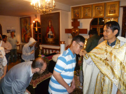 oHellKungo 
Kissing Fr. Danai's hand 
2013-01-07 20:39:31
