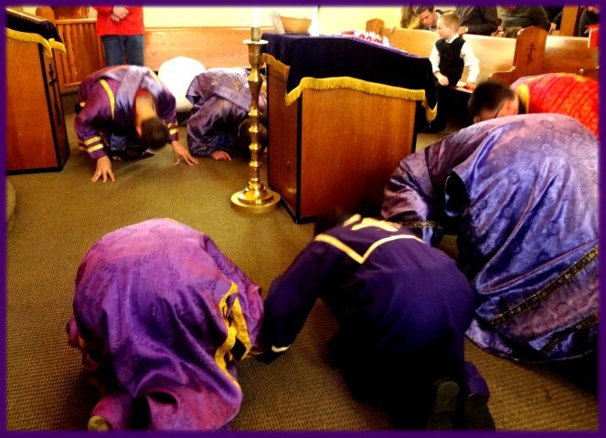 Before Thy Cross we bow down in Worship