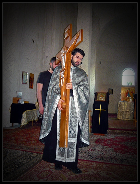 Today was hanged on wood He who hung the earth upon the waters ...