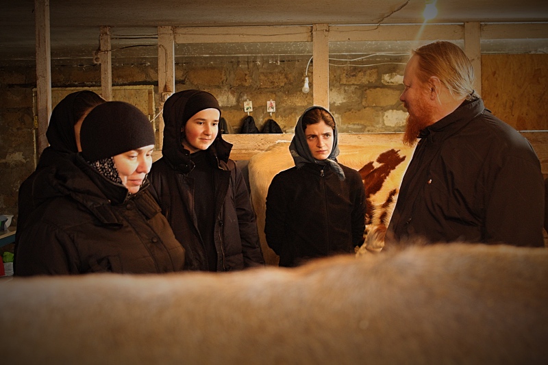 The ghostly father, mother hegumeness and sisters in the cowshed