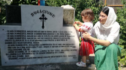 Florina 
Filofteia, the priest&#039s daughter, nourishes the sparrows beside a prayer. 
27 
2017-07-02 21:25:30