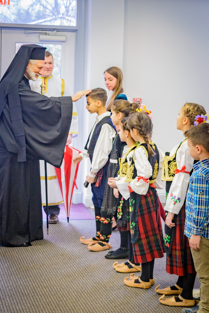 Kids greeting the Bishop before Liturgy
