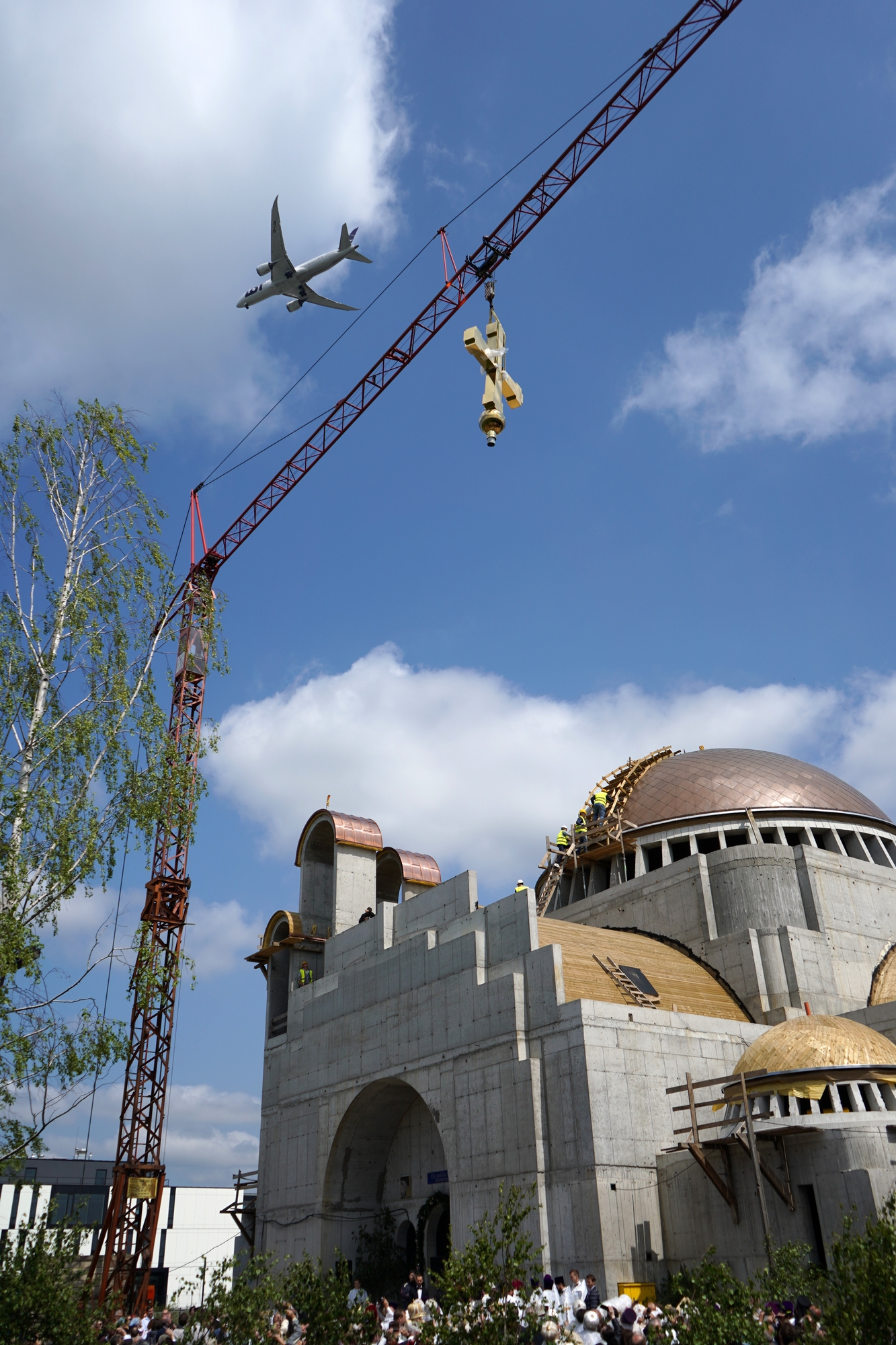 Blessing and elevation of main cross on the roof of Hagia Sophia Orthodox church in Warsaw