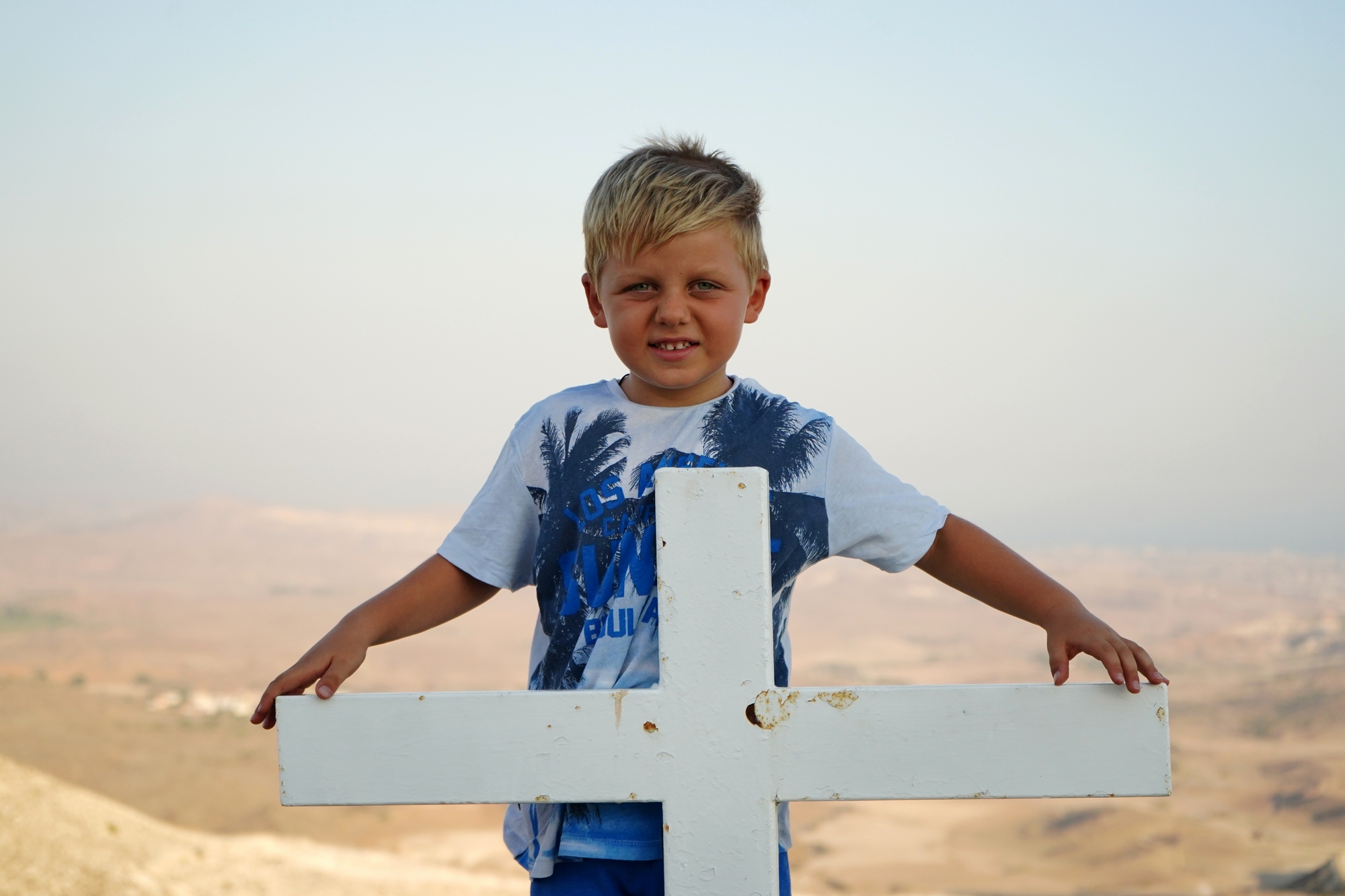 Adam and a cross close to St. Marina church