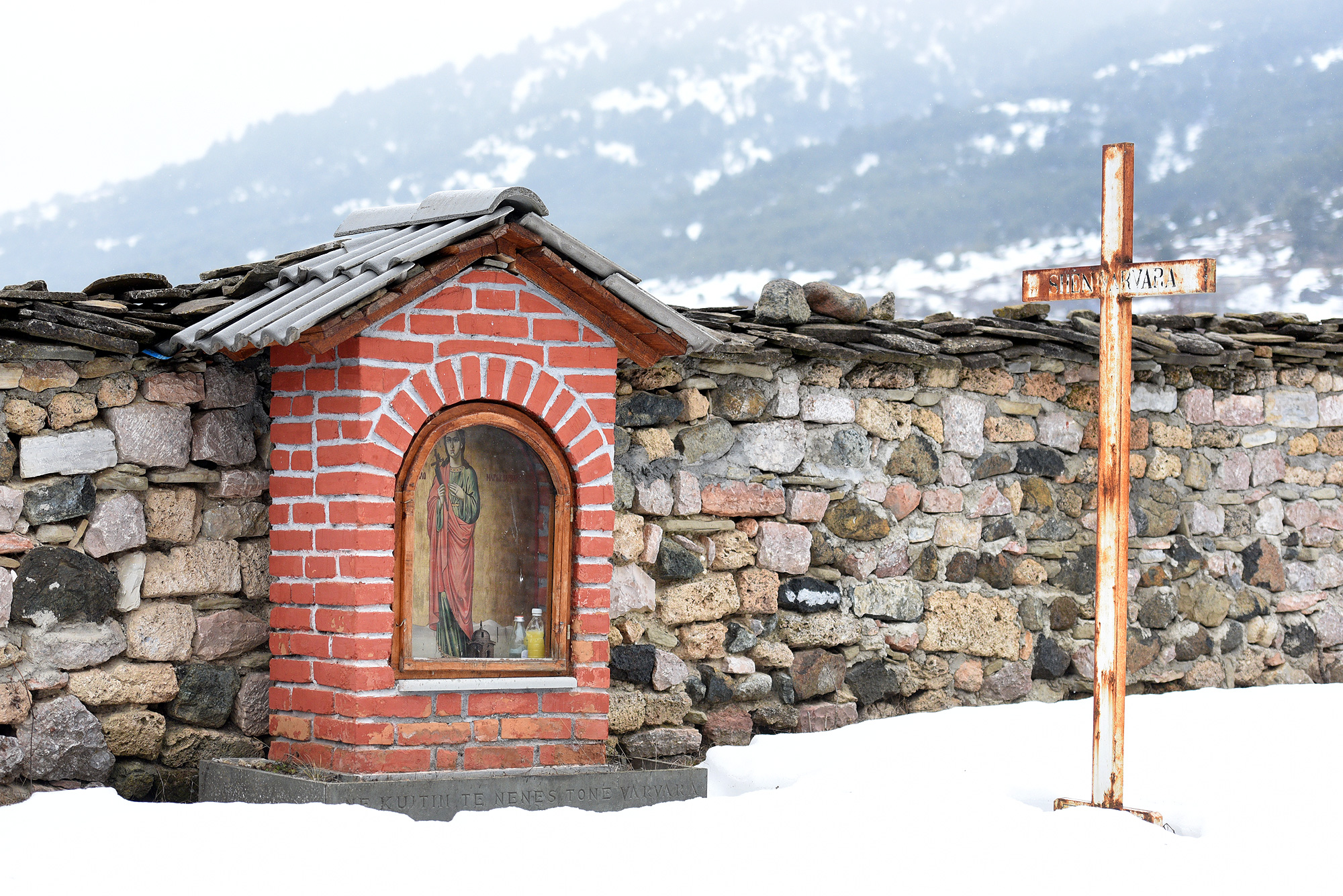 at Archangels Orthodox church yard in Voskopoje