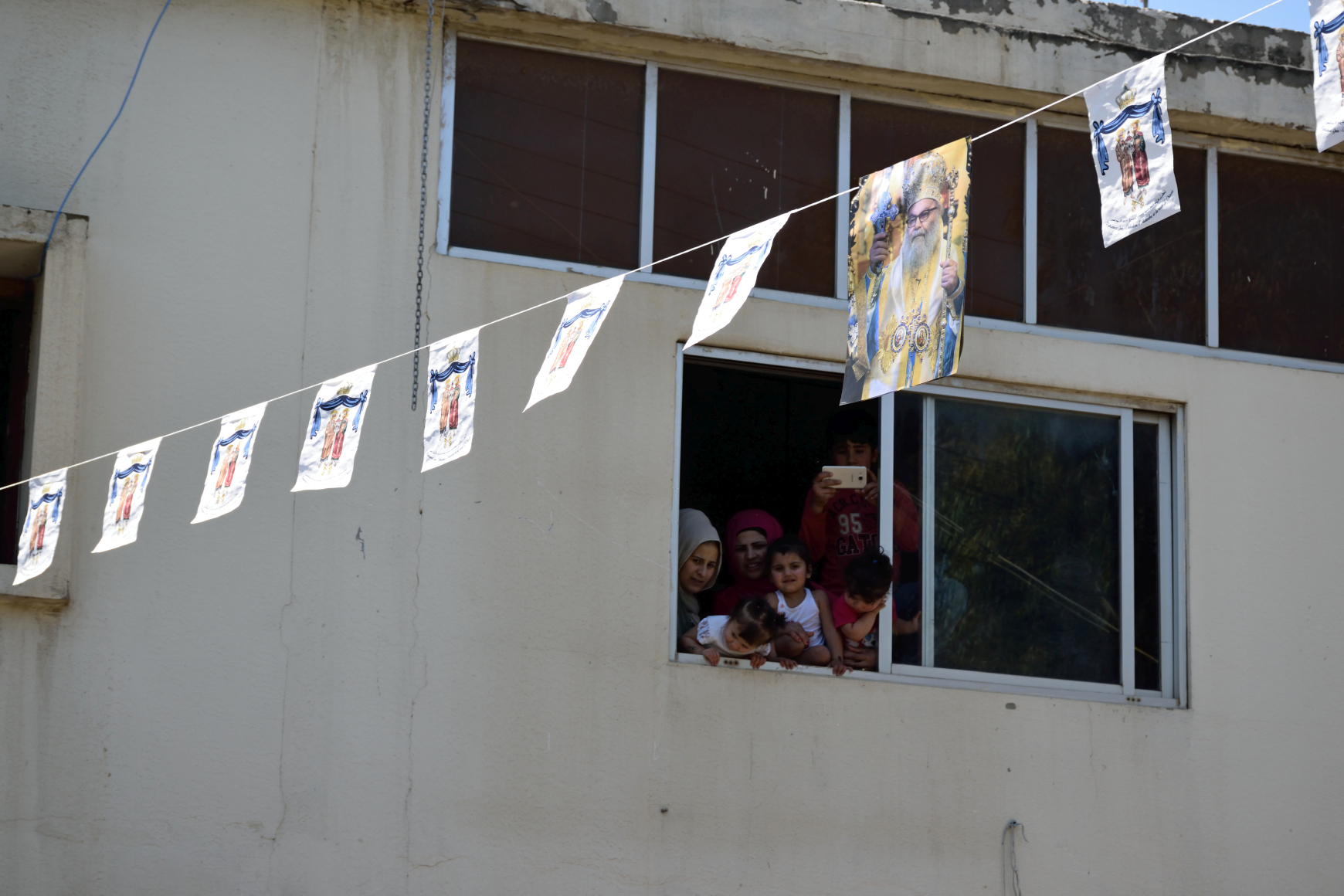Rahbe- Muslims filming the welcome of Antiochian patriarch John