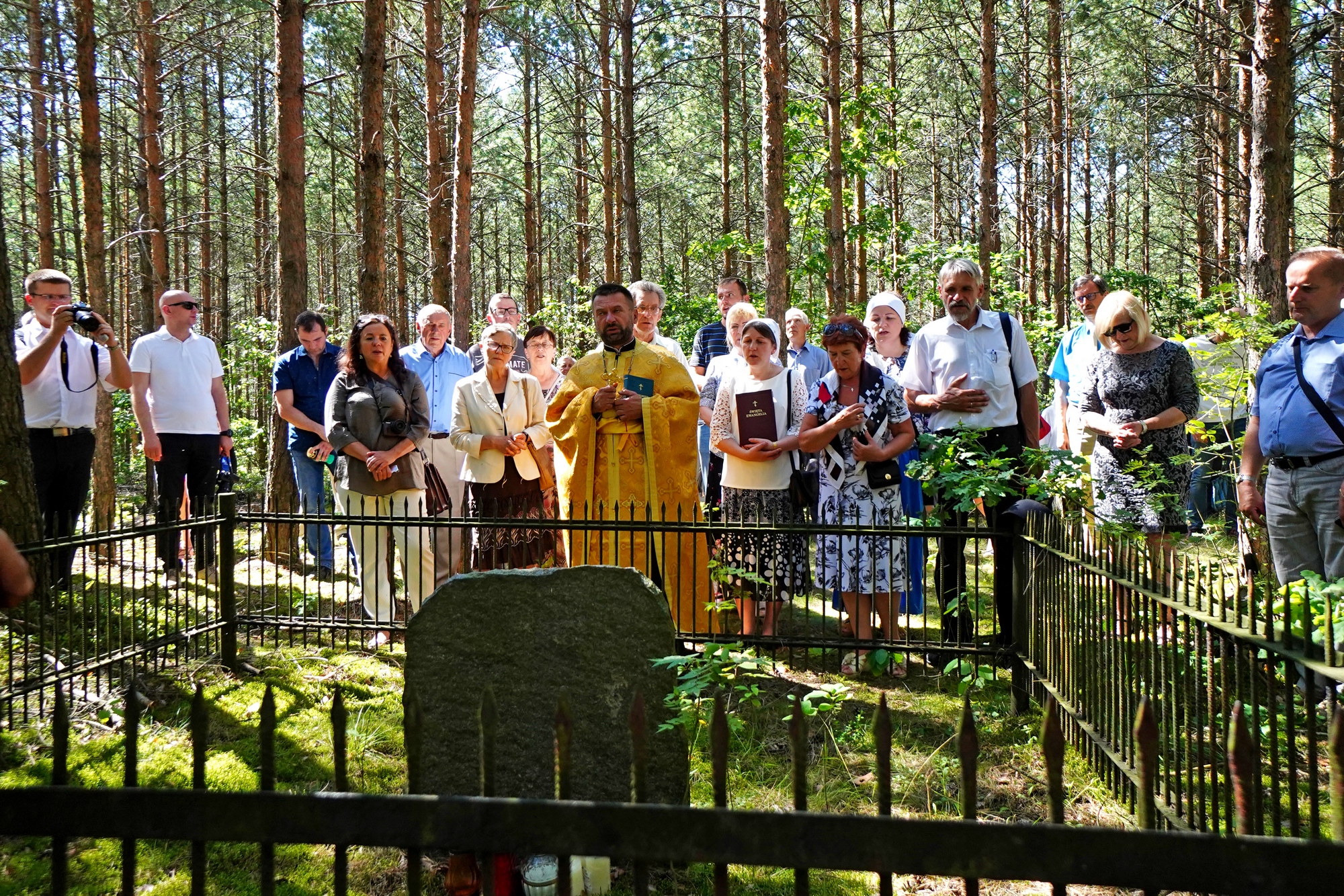 The prayer in the wood at Podlasie Martyrs grave close to Puchały Stare