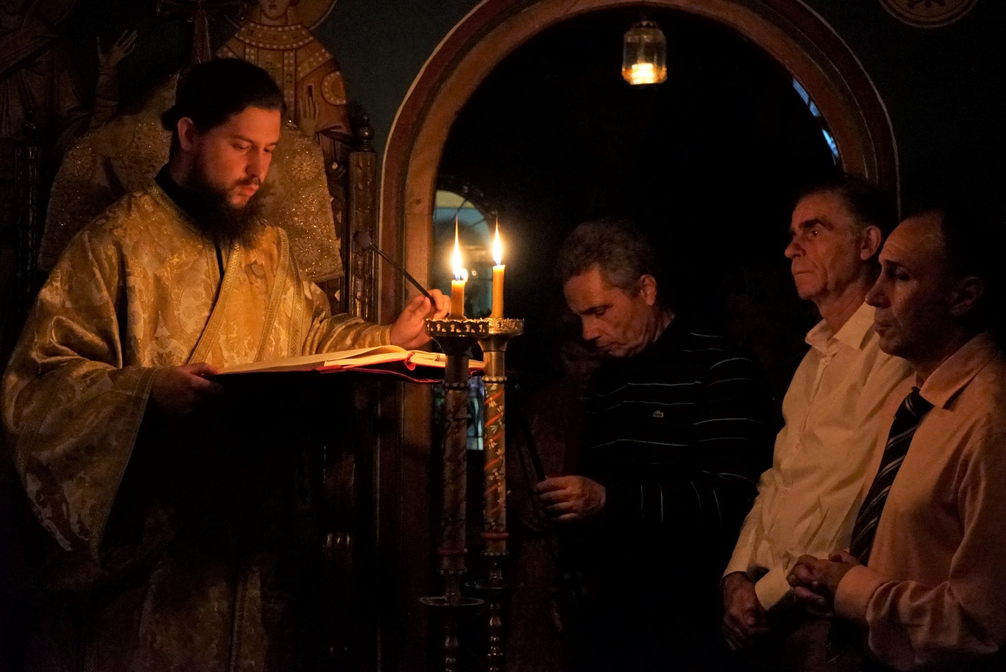 Hearing the Holy Gospel in an all night vigil. 