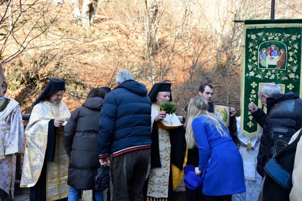 Blessing people by the Holy Water, Epiphany 2022 at Rila monastery