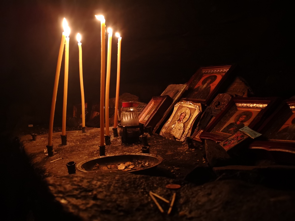 Cave of st. John of Rila, icons, candles 2022