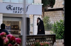 Sheep1389 
Contrast - Muslim woman and Coptic monk in front of the Eastern Orthodox Centre, Nazareth 
2024-10-09 15:11:05