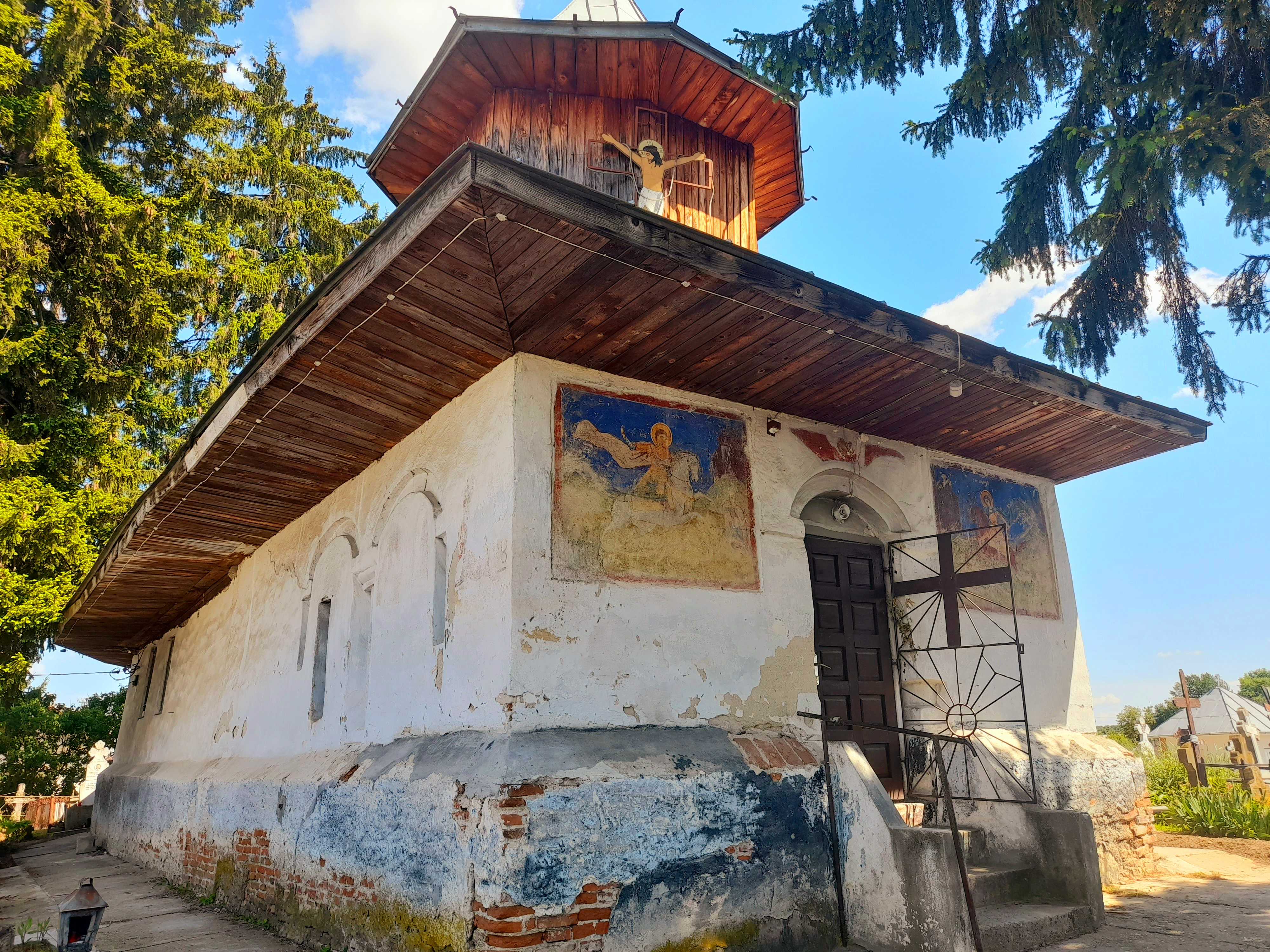 Saint George church from an old cemetery in a village, Romania